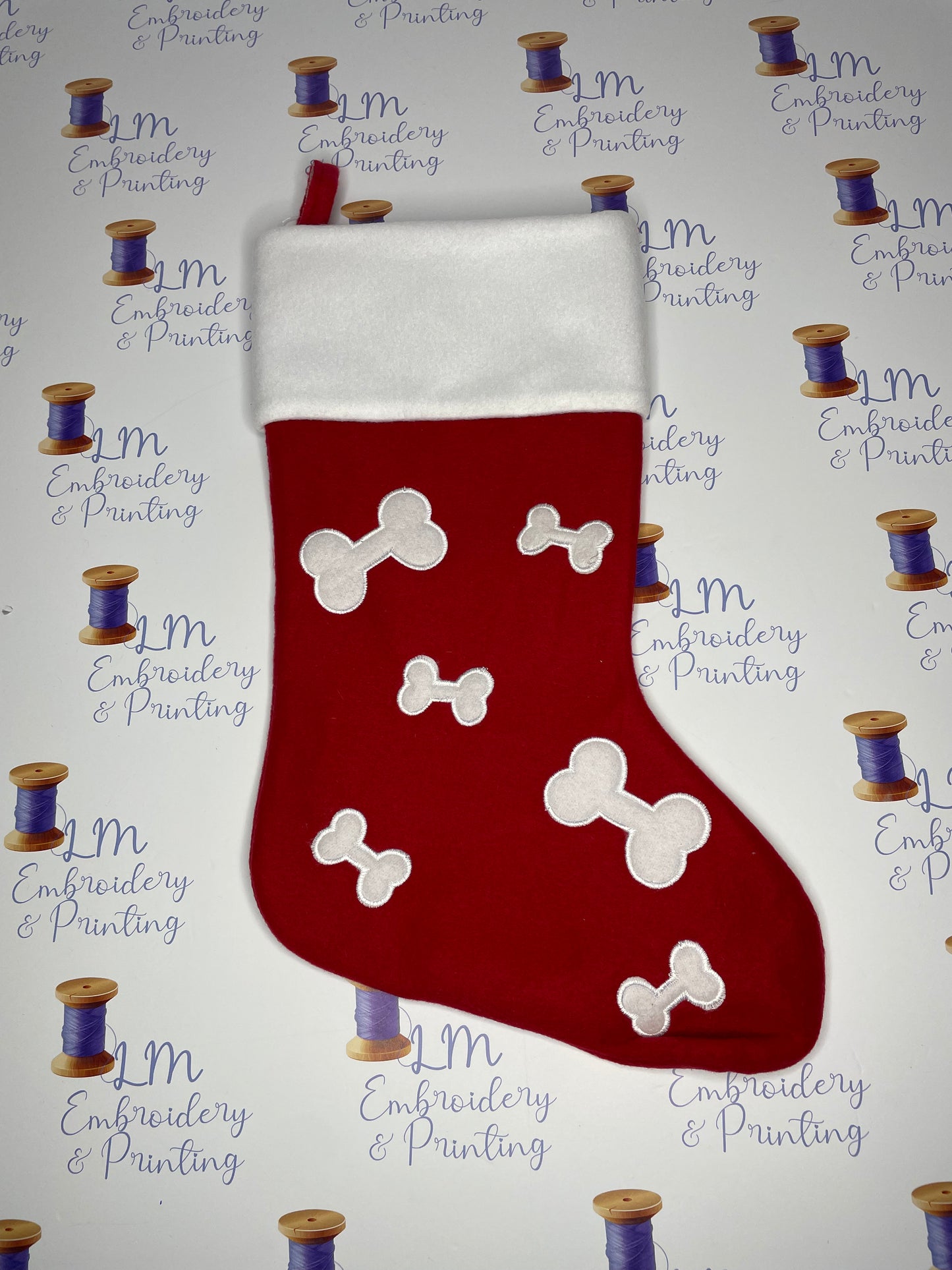 DELUXE PLUSH RED BONES STOCKING