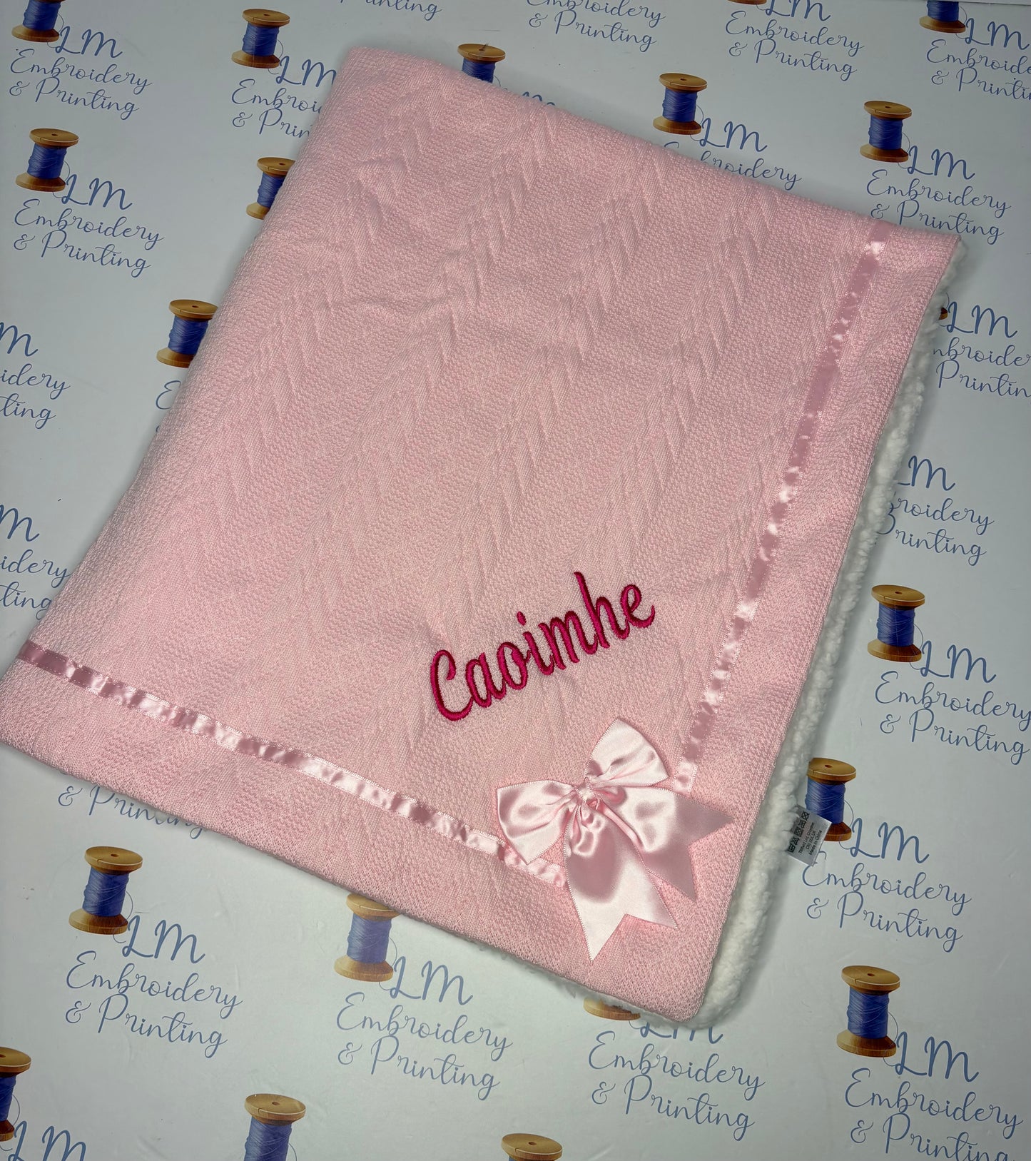 CHEVERON CABLE KNIT BLANKET WITH TRIM & BOW