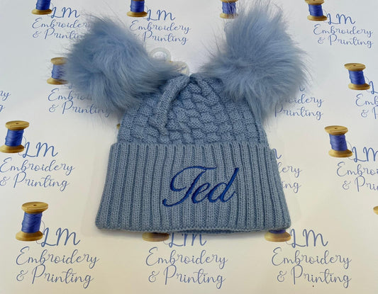 Blue double pom pom knitted beanie