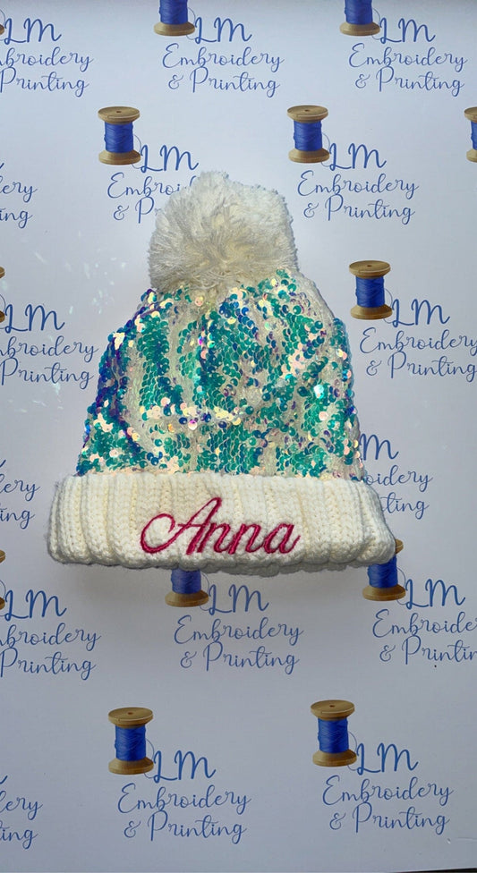 Glitter effect pom pom knitted fleece lined beanie
